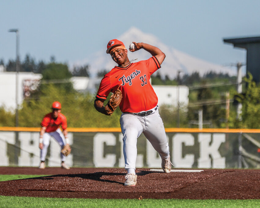 Battle Ground&rsquo;s James Gill III fires in a strike in the Tigers&rsquo; 5-1 win over the Union Titans on Thursday, May 1.