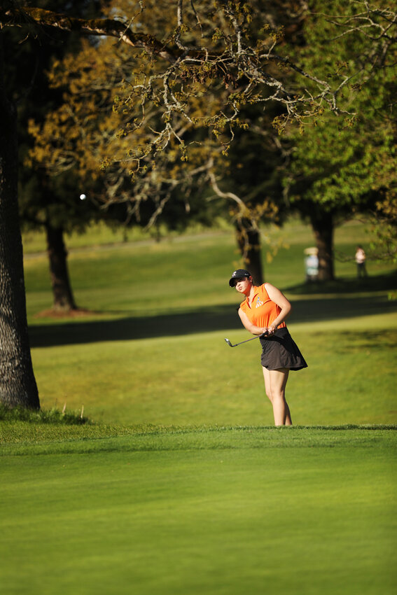 Lily Peralta chips a shot at Tahoma Valley Golf Course on Thursday, May 1.