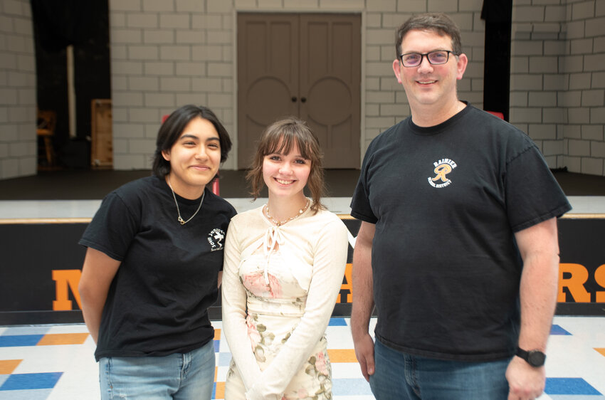April Anguiano, left, Mikkie Shaw, middle, and Adam Cornwall pose hours before the first performance of &quot;The Brothers Grimm Spectaculathon&quot; at Rainier High School on Friday, May 9.