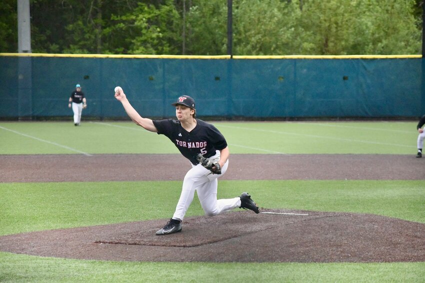 Senior pitcher/outfielder Wyatt Robison delivers a strike in a District 3/4 4A playoff game against Auburn Riverside on Tuesday, May 13.