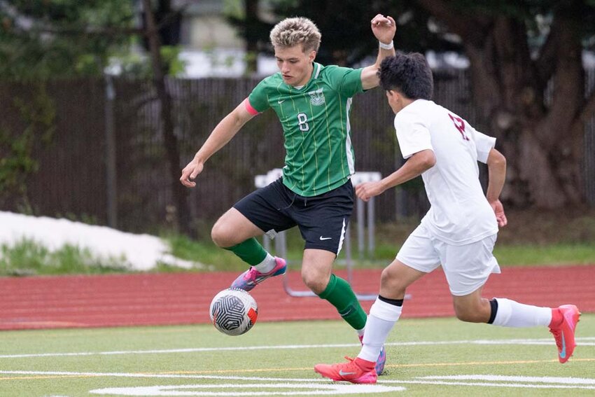 Tumwater&rsquo;s Gavin Cuoio kicks a pass during a District 4 Tournament Semifinal loss to W.F. West at Tumwater High School on Tuesday, May 13.