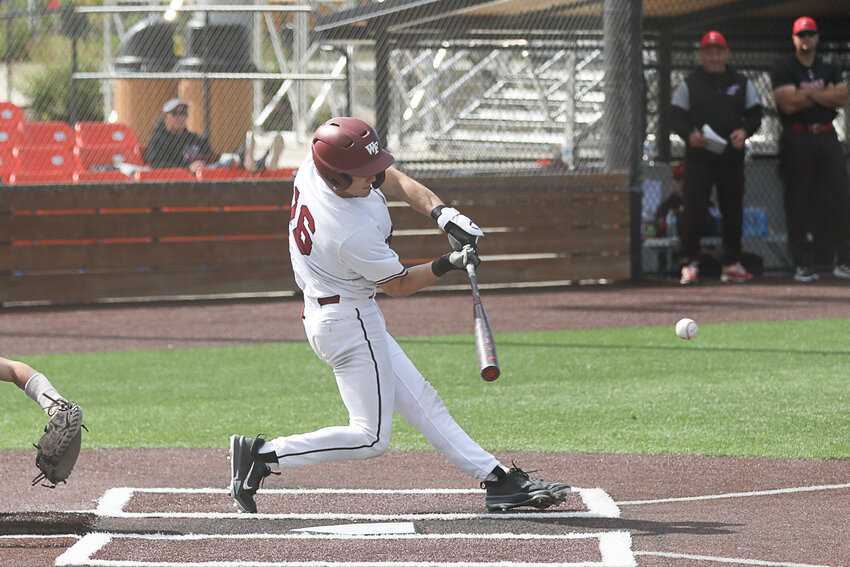 W.F. West's Deacon Meller swings at a pitch during W.F. West's 11-1 win over R.A. Long in a 2A District 4 Semifinal in Ridgefield on May 14.