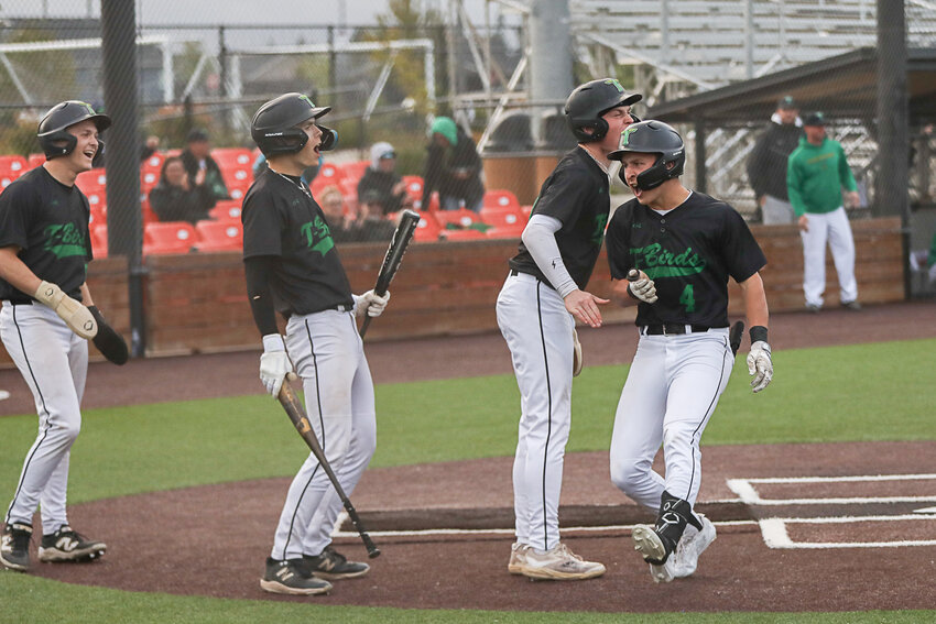 Tumwater's Charlie Crawford (4) celebrates after scoring a little league home run during Tumwater's 11-1 win over Hockinson in a 2A District 4 Tournament in Ridgefield on May 14.