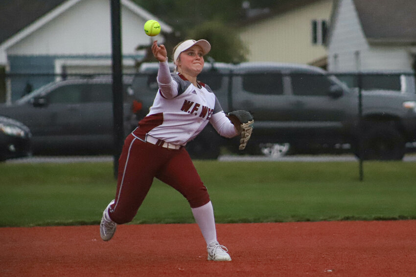 W.F. West's Avalon Myers (22) makes a throw to first base against Ridgefield in a 2A District 4 quarterfinal at Recreation Park on Thursday, May 15.