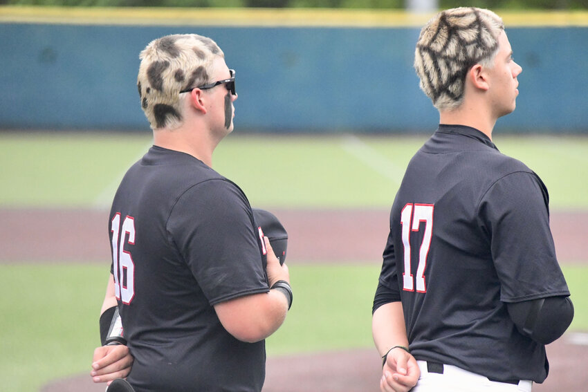 Yelm’s head coach Dakota Hill watches on as his team plays its first district playoff game in seven years on Tuesday, May 13.