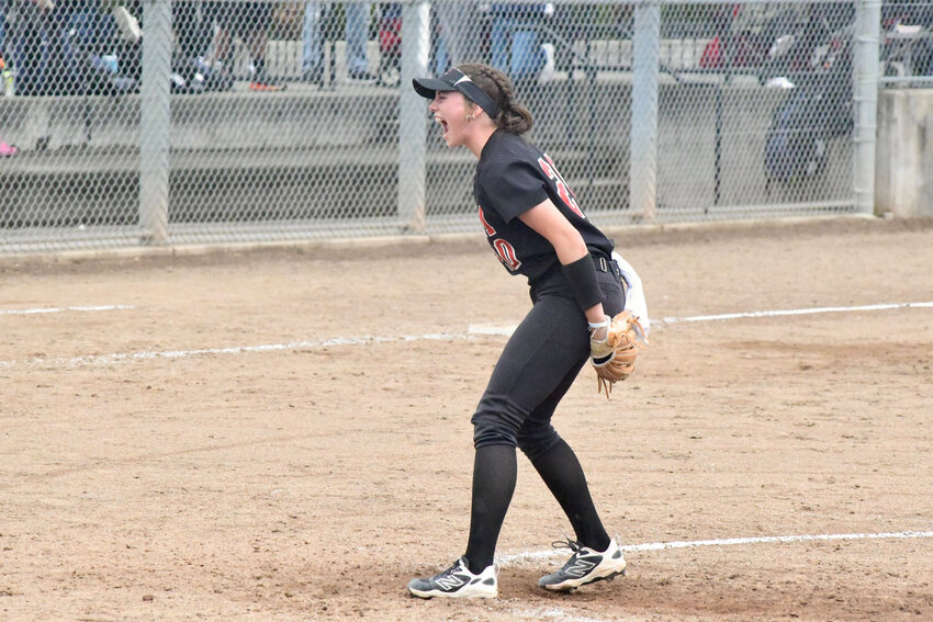 Senior pitcher Austin Hitchner celebrates a big strikeout in the seventh inning against the Rogers Rams on Friday, May 16.