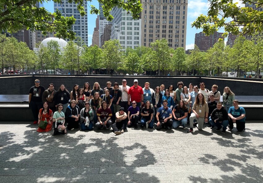 Yelm High School Choir members pose for a photo at the 9/11 Memorial and Museum in New York City.