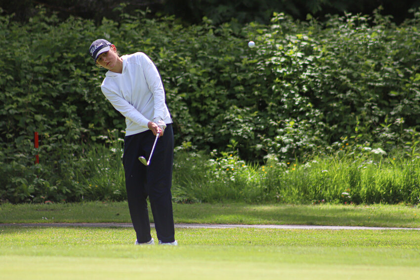 Black Hills' Ellie Johnson hits a chip shot during the 2A golf state championships at Tumwater Valley Golf Course on Wednesday, May 21.