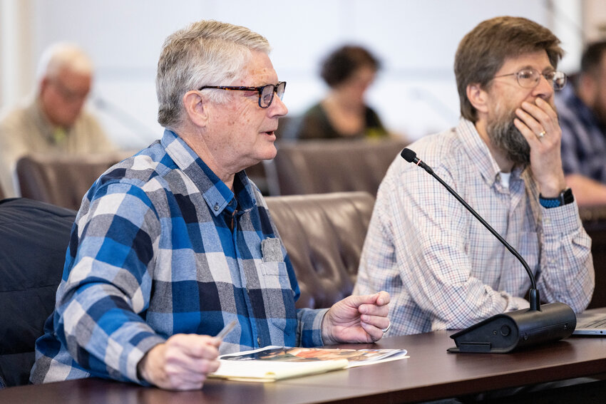 Timberland Regional Library trustee Hal Blanton, left, speaks about the libraries alongside trustee Brian Mittge during a Lewis County commissioners meeting at the Lewis County Courthouse in Chehalis on Tuesday, May 20.
