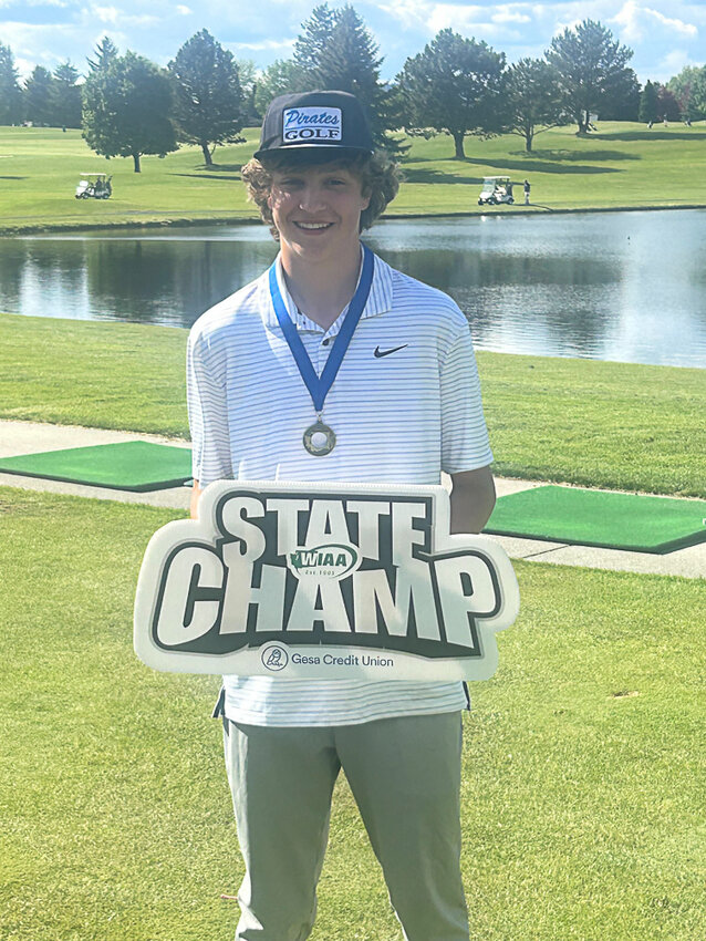Adna's Trevin Salme poses for a photo after winning the 2B Boys State Tournament at MeadowWood Golf Course in Liberty Lake on May 21.