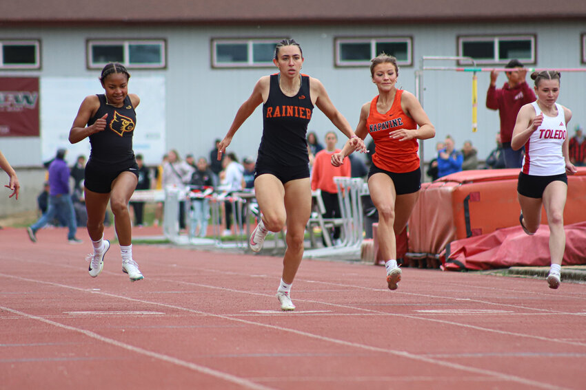 Rainier's Acacia Murphy wins the 100-meter sprint at the 2B District 4 Championships at W.F. West High School on Thursday, May 22.