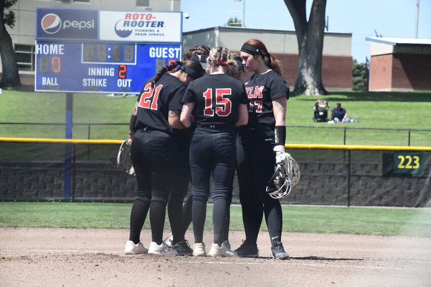 Yelm softball&rsquo;s infield huddles prior to taking their positions against Skyview in the WIAA&rsquo;s 2025 4A state softball tournament on Friday, May 23 in Richland, Washington.