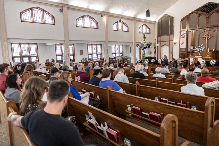 Jennifer Polley, a Hope Housing Collaborative of Lewis County board member and member of Harrison Square Presbyterian Church, speaks during a meeting on safe parking at Chehalis United Methodist Church on Thursday, May 22.