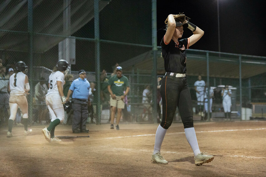 Napavine's Hayden Kaut walks off the field after a 2B State Softball Tournament elimination game at Gateway Sports Complex in Yakima on Friday, May 23.