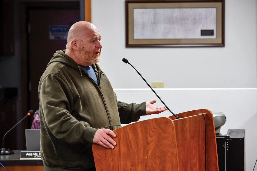 Nathan Bardue, a veteran and resident of Woodland Shores RV Park, speaks during the Woodland City Council meeting on Monday, May 19, sharing how the park provided him with stability and access to vital services. The council voted unanimously that night to rezone the 57-lot park to allow year-round residency, making it the first to gain permanent status under a 2024 ordinance.