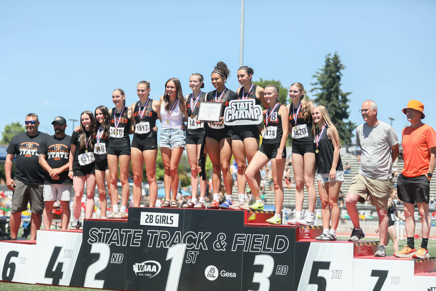 The Rainier girls track team is honored as the 2B Girls Academic State Champions during the State Track and Field Championships in Yakima on May 30.