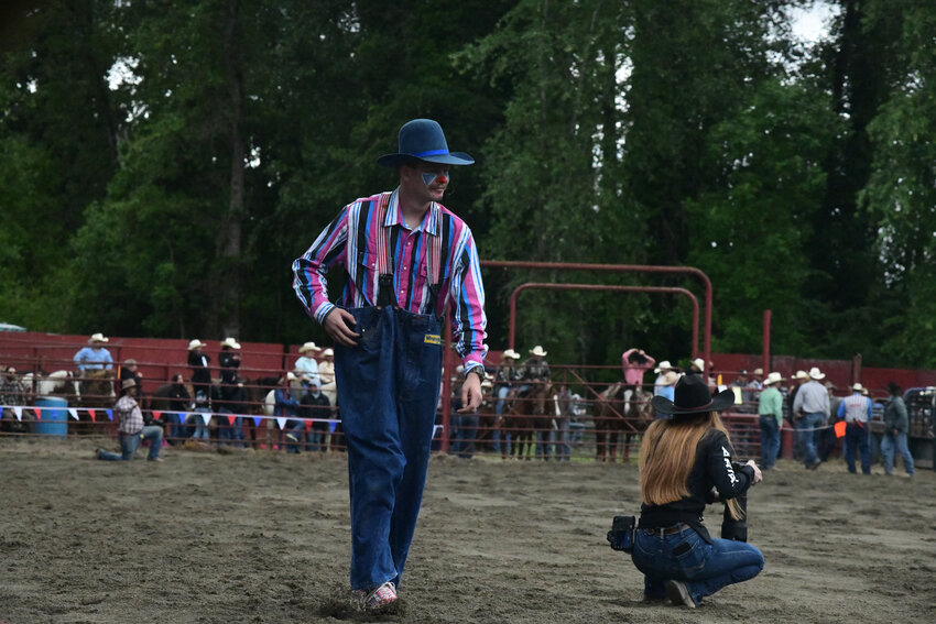 The Roy Rodeo clown walks amongst the area on Saturday, May 31.