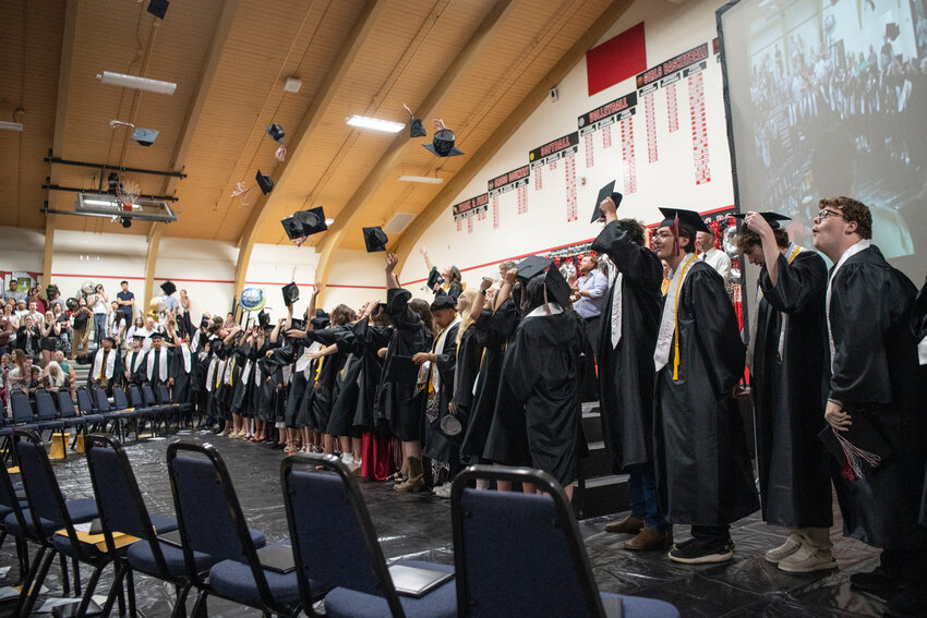 Graduates toss their caps after the Mossyrock High School class of 2025 graduation ceremony in Mossyrock on Saturday, June 7.