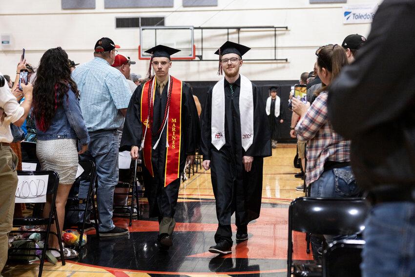 The Toledo High School class of 2025 walk to their seats during a commencement ceremony at Toledo High School on Saturday, June 7.
