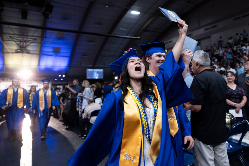 Rochester graduates walk out of the commencement ceremony at Saint Martin&rsquo;s University in Lacey on Sunday, June 8.