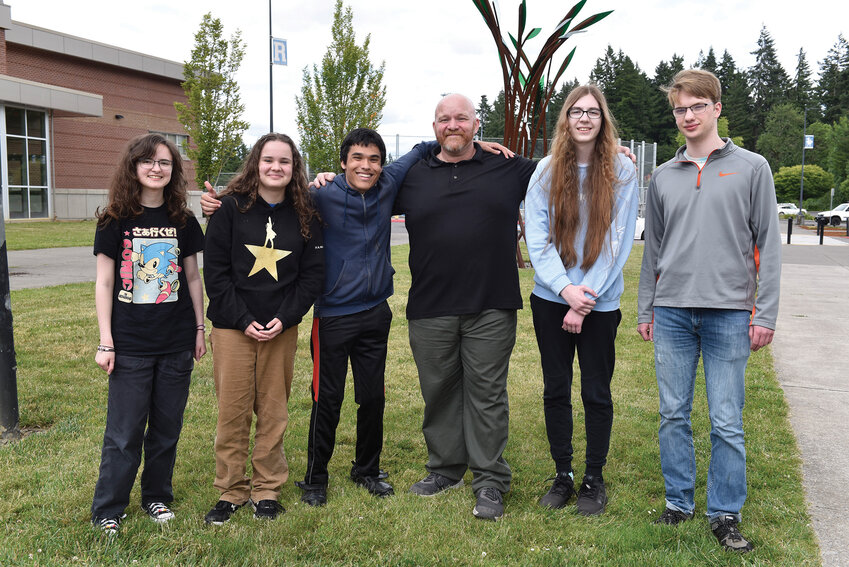 Sadie Ford (left), Margaret Turner, James Haddix, Coach David Jacobson, Katie Thiel and Nathan Walker met last week one last time before the end of the school year. Ridgefield High School's Knowledge Bowl team capped off a historic year after winning the state Knowledge Bowl title earlier in March.