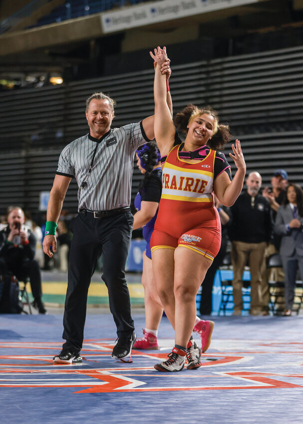 Prairie&rsquo;s Faith Tarrant became the first ever four-time state wrestling champion from Clark County on Friday, Feb. 21, with a first round pin over Olivia Hudson of Oak Harbor for the girls 235-pound crown in girls 3A wrestling.