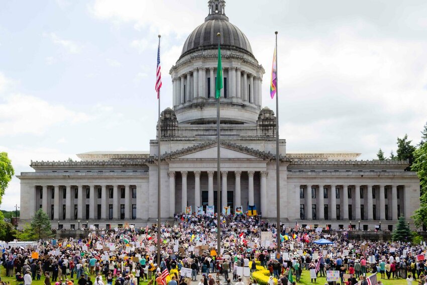 Thousands of people gathered in Olympia for the “No Kings” rally on Saturday June 14, 2025 at the state Capitol. (Photo by Jacquelyn Jimenez Romero/Washington State Standard)