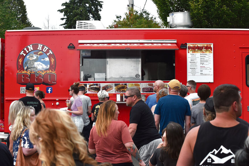 Attendants of the Nisqually Valley Barbecue Rally attend Tin Hunt BBQ for a plate of smoked food during the event in 2024.