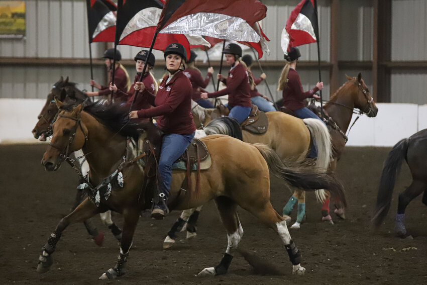 The W.F. West equestrian drill team fine tunes its pattern during a practice at Rocky Top Arena in Onalaska on Monday, June 16.