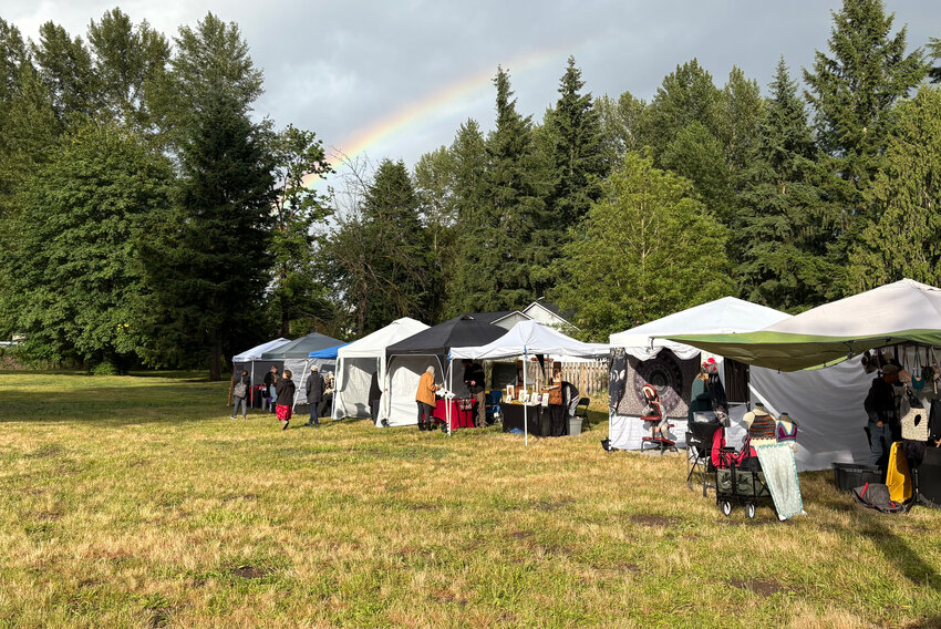 A rainbow breaks out at the Summer Solstice event at McKenna Park on Friday, June 20.