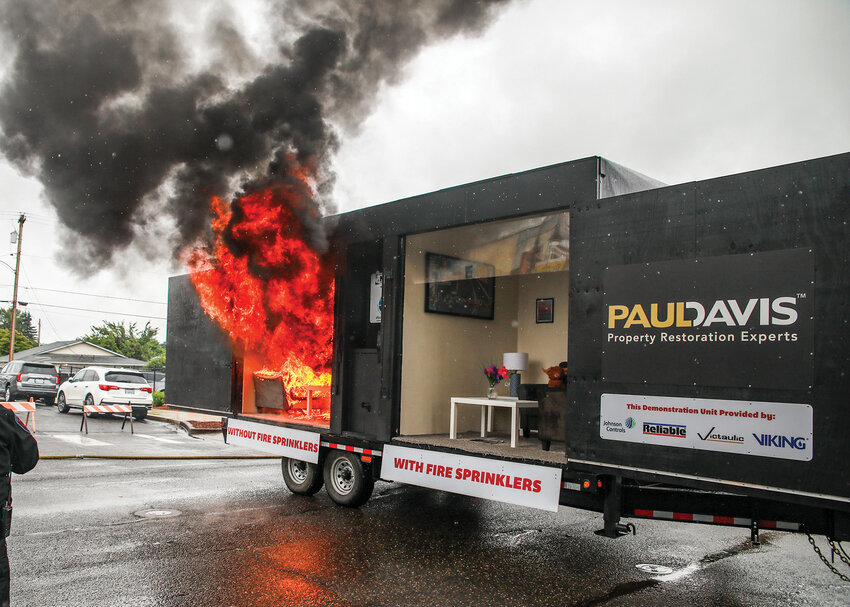 A live fire sprinkler system demonstration showed the difference between a room with and without fire sprinklers by Clark-Cowlitz Fire Rescue (CCFR) and Paul Davis Property Restoration Experts on Saturday, June 21 during Planters Days in Woodland.