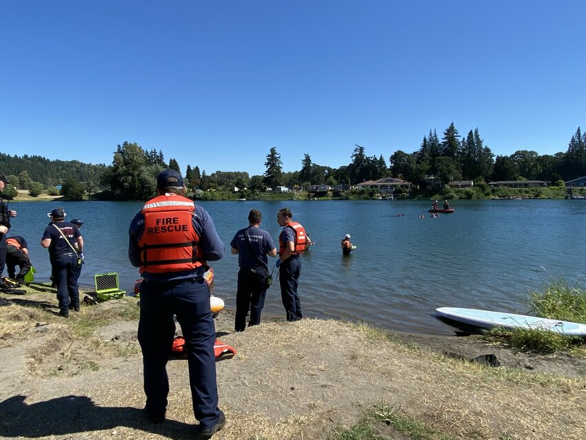 Emergency responders search Horseshoe Lake in Woodland on Monday, July 30. The search began after a man went underwater and did not resurface around 3 p.m., prompting a recovery effort that lasted several hours.