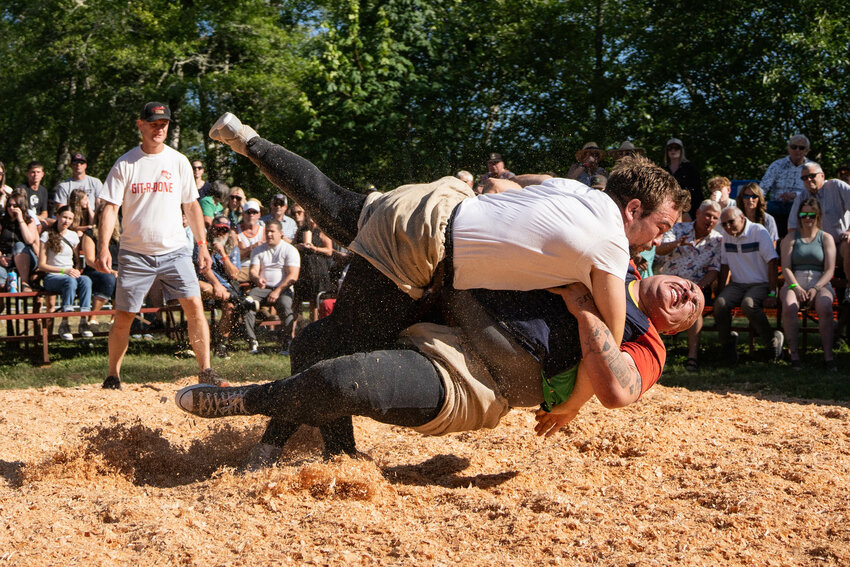 Morgan Lujan of Sacramento, California, executes an over the shoulder drop to pin Peter Ming and win the 2025 championship match during the Lewis-Pacific Swiss Society&rsquo;s 62nd annual Schwingfest on Saturday, July 5, in Frances.