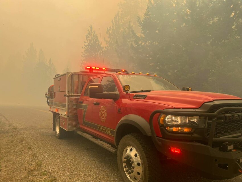 Photos of a Lewis County Fire District 5 fire truck shrouded in smoke while on assignment at the Hope Fire in Northeast Washington north of Kettle Falls posted to the district's Facebook page on Thursday, July 10.
