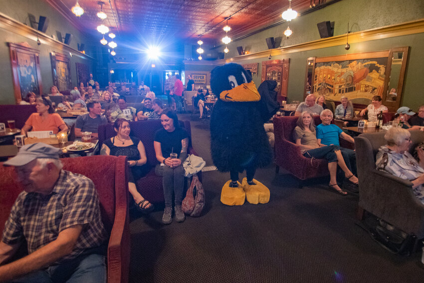 The Yard Birds mascot welcomes attendees to a McMenamins Olympic Club History Pub presentation on Tuesday, July 15, in downtown Centralia.