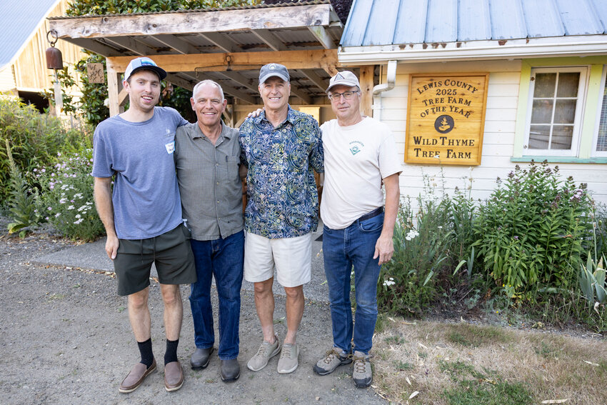 From the left, Nick Henrikson, Jack Wight, Richard and John Henrikson pose for a photo at Wild Thyme Farm in Oakville on Tuesday, July 15. Wild Thyme Farm won the Lewis County 2025 Tree Farm of the Year.