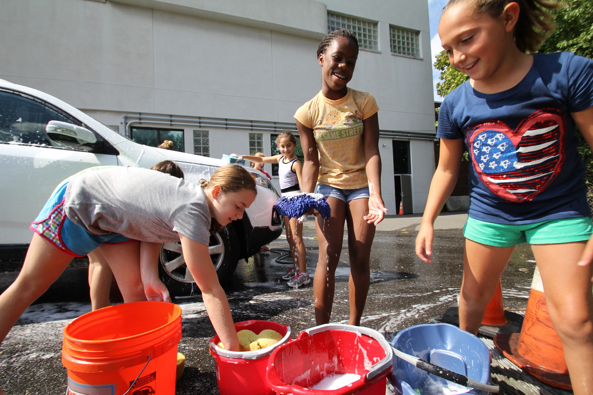 Working at the car wash | Herald Community Newspapers | www.liherald.com