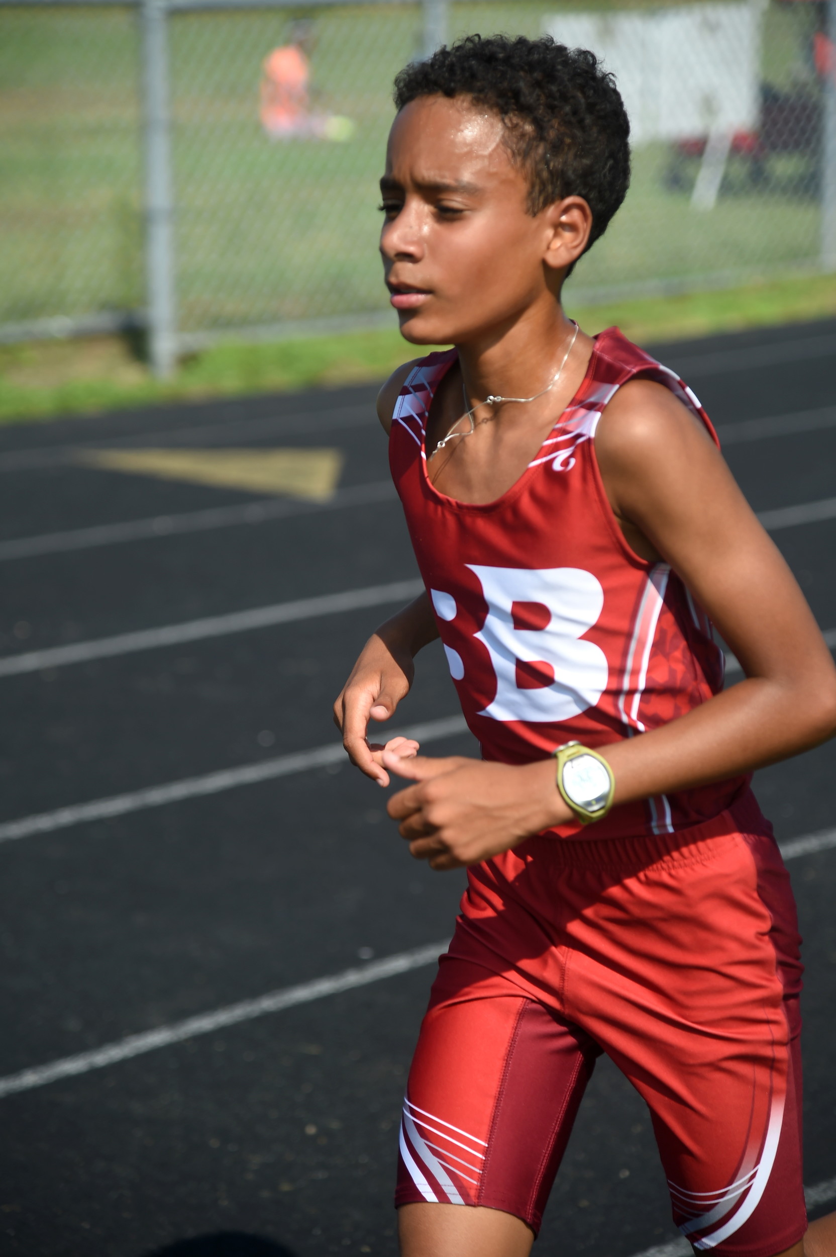 Aaron Langston, 12,runs down the Baldwin Middle School track.