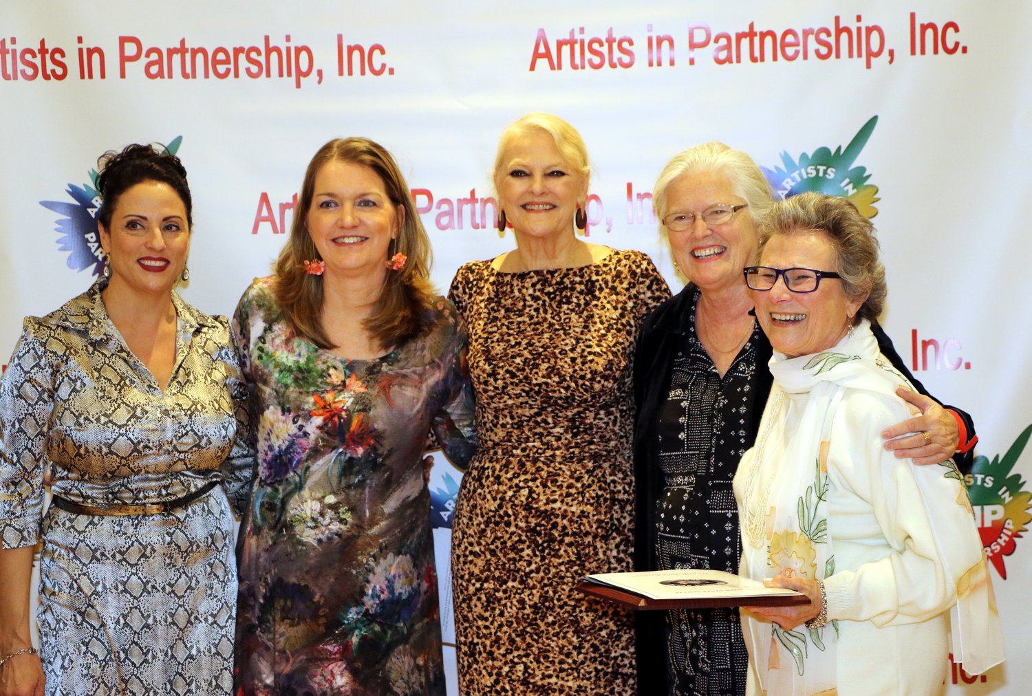 DeVarso, left, Connolly, Mathieson-Ellmer and Ramsey congratulated Jaclyn Feldman on her Lifetime Achievement award.