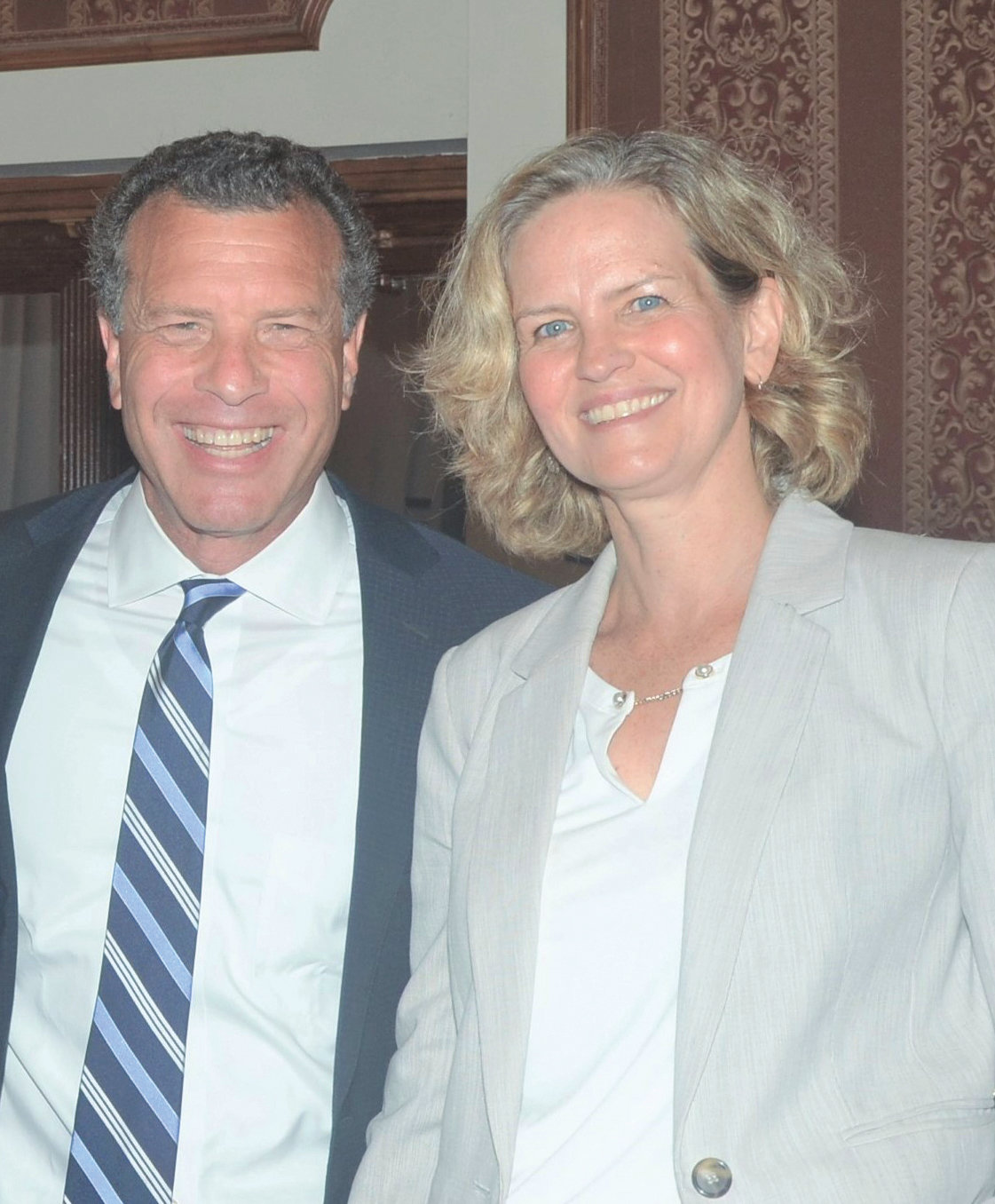 Stuart Richner, the president and publisher of Richner Communications, left, was with Nassau County Executive Laura Curran, at the Aug. 8 event.