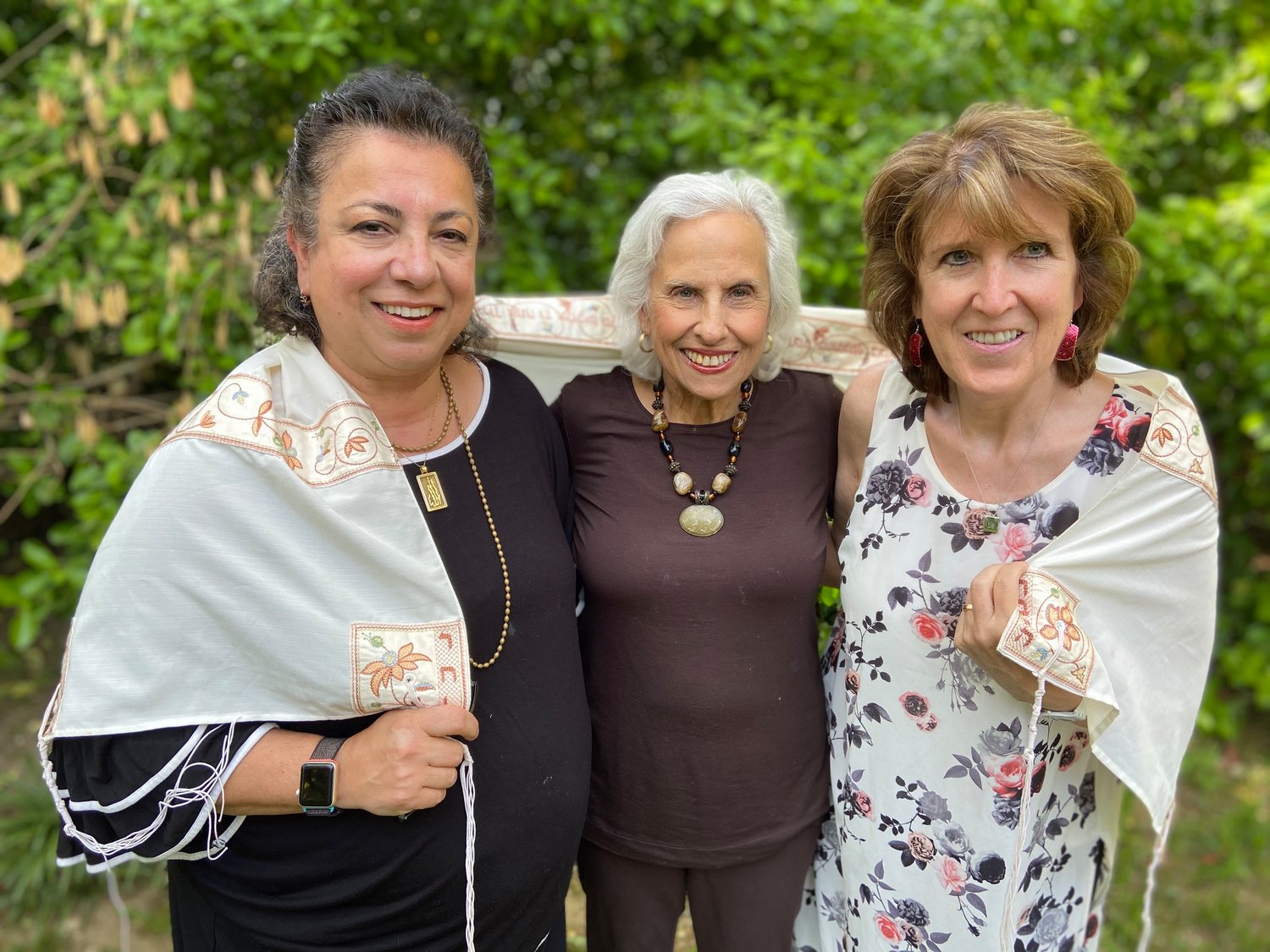 Mojdeh Hassani, left, Fredda Klopfer and Lisa Larsen Hill have become friends through Seeds of Faith for Women.