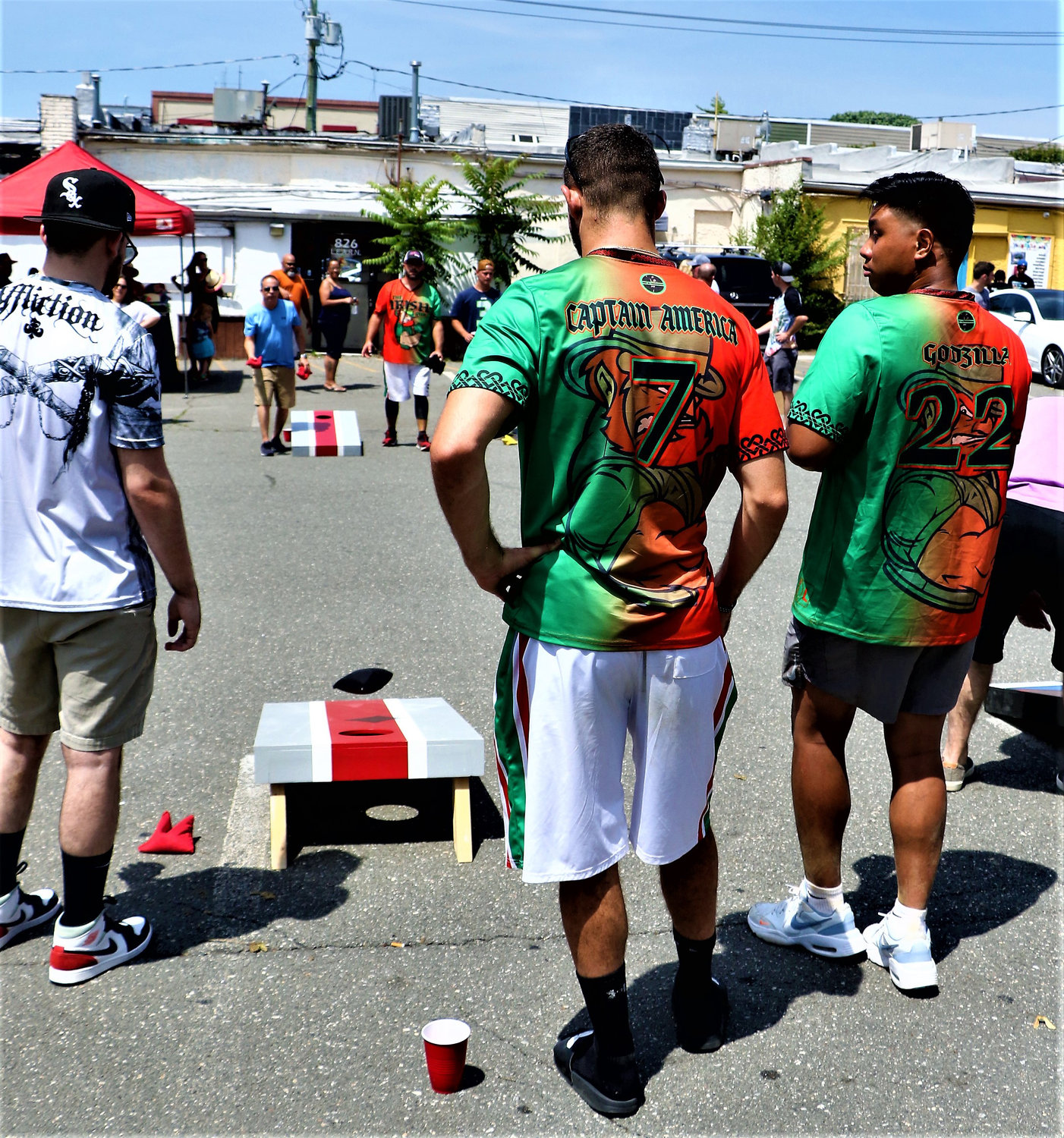 Baldwin residents played in a cornhole contest in the parking lot behind The Irish Pub, one of the sponsors of the Culture Jam.