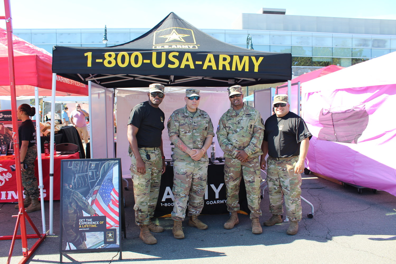 U.S. service members stood at their recruitment booth.