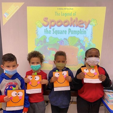 Part of Ms. Emily Valentino’s kindergarten class, Maurice W. Downing School students Na'Yirah Hayes, Ava Rose Vishnudat, Liam Troise, Jeter-Marie Midi and Michelle Joya Cruz listened to the story and created their own pumpkins.