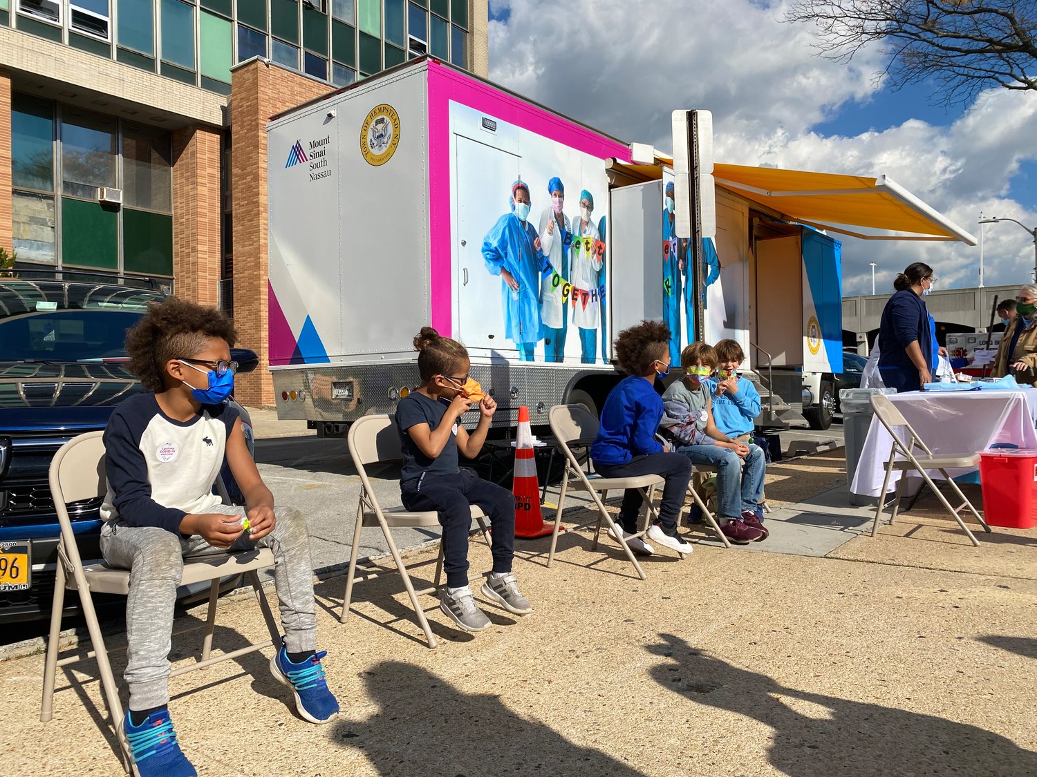 The Blount and Torreblanca children received their doses at the Mount Sinai Vaxmobile.