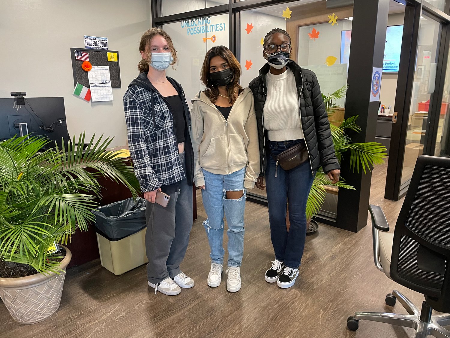 Malverne High School students Olivia Brown, Sabrina Ramhararkh and Kaila Lawrence took part in the Linder Place Project, a student-run campaign to have the street name changed.