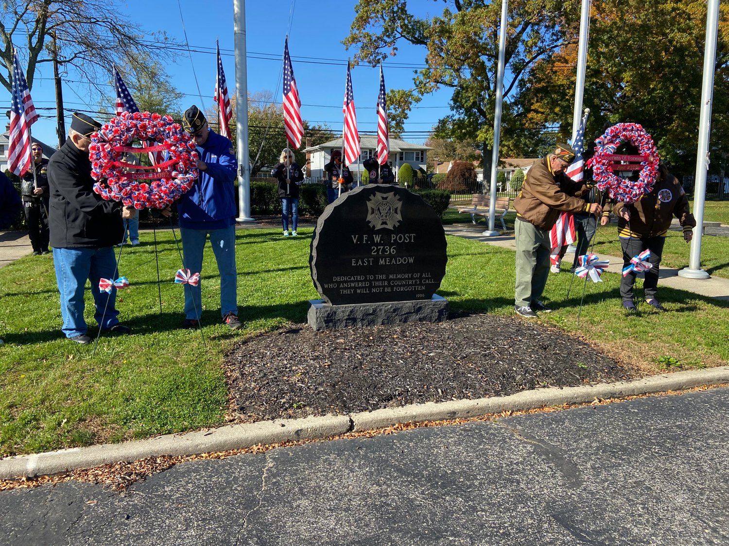 Members of East Meadow American Legion Post 1082 and Veterans of Foreign Wars Post 2736 laid wreaths next to the memorial.