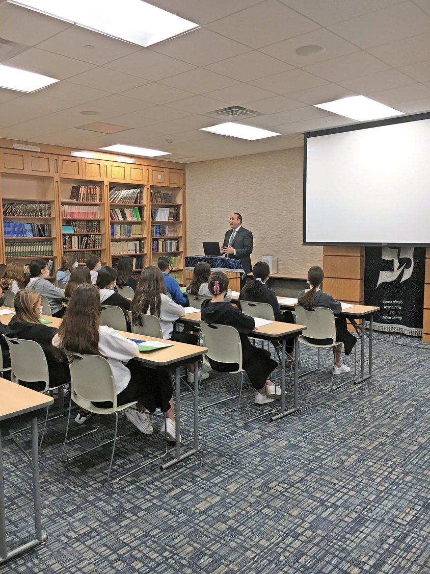 Rabbi Adam Englander, HALB’s head of school, spoke to eighth-graders on the importance of the Names, Not Numbers project.