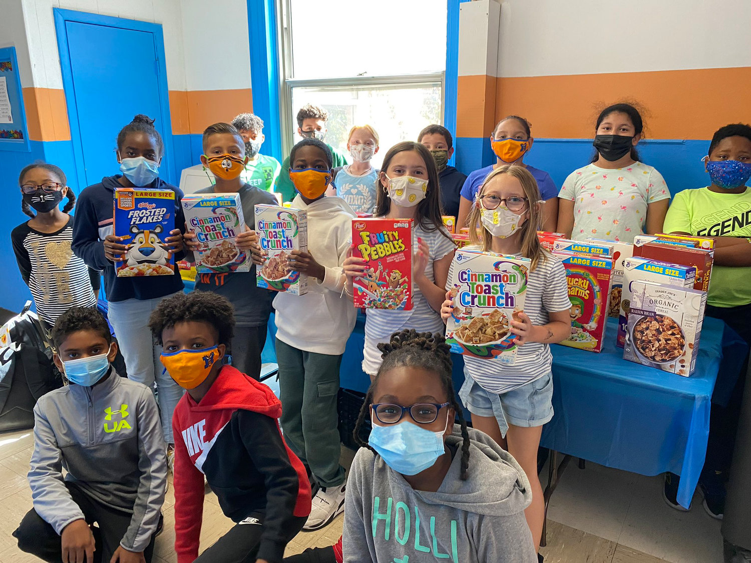 Fifty-five boxes of cereal were donated by student members of the Davison Avenue Intermediate School’s Special Forces for Better Breakfast Month.