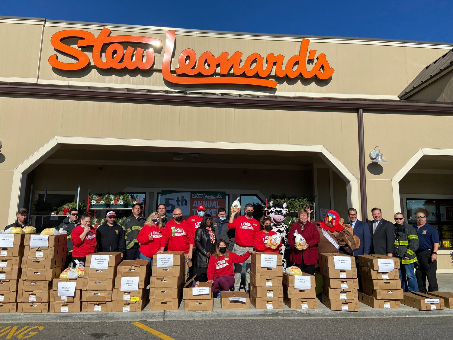 Stew Leonard’s employees, elected officials and members of the East Meadow Fire Department helped pack cars and vans with the donated turkeys.